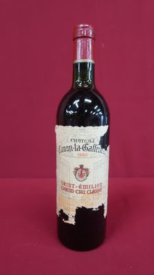 a bottle of wine that is sitting on a table