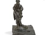 an image of a bronze statue of a man holding a child