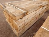 many pieces of wood stacked on top of each other