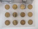 a lot of coins that are on the table