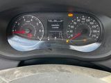 a close up of a car dashboard with a speedometer and gauges