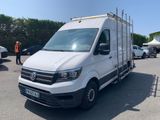 a white van that is parked in a parking lot