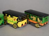 three toy trains that are sitting next to each other