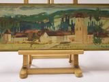 an image of a painting on a easel with a painting of a village