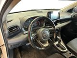 the interior of a car with a steering wheel and dashboard