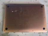 an overhead view of a metal plate with holes in it