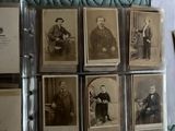 a lot of old photos of men sitting on a couch