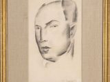 un dessin au crayon représentant le visage d'un homme, dans un cadre doré