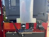 a close up of a machine that is sitting on the ground