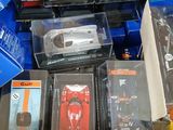 many different types of toy cars in the box