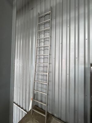 a ladder leaning up against a wall in a room