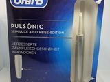 packaging of a toothbrush in a box on a white surface