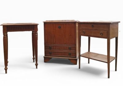 three pieces of furniture that are sitting on a white surface