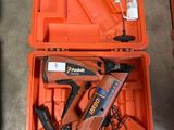 an orange tool case with tools in it sitting on the floor