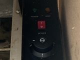 an image of a black control panel in a room