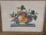 a picture of a picture of a basket of fruit on a table