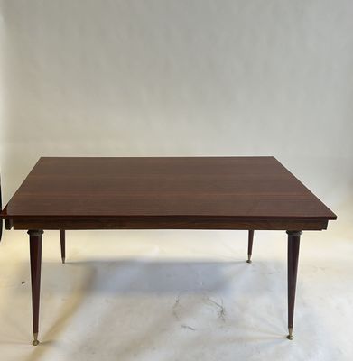 an image of a coffee table with a wooden top