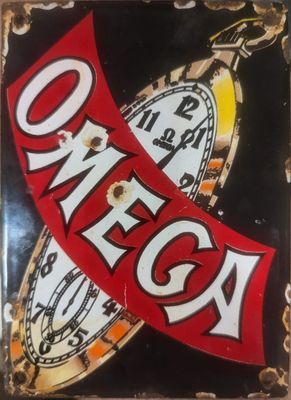 une enseigne portant l'inscription « omega » sur le côté d'un immeuble