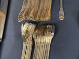 a table with silverware and silverware on it