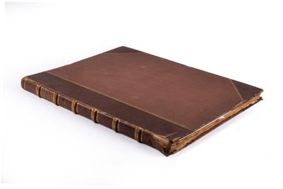 brown leather bound book on white background with copy space for text
