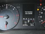 a close up of a car dashboard with a speedometer and other gauges