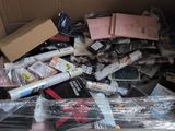 a cardboard box filled with books and other items