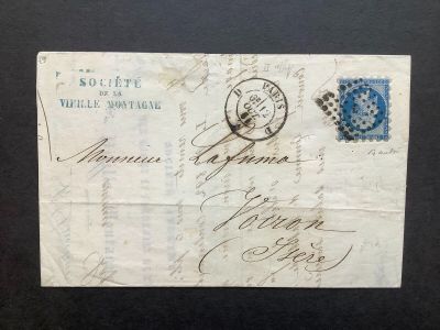 un gros plan d'un morceau de papier sur lequel est apposé un timbre