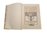 an open book with a drawing of a tree on it