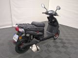 a scooter that is parked in a room
