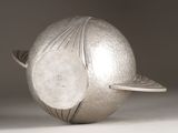 a silver object that is sitting on a table
