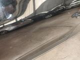 a reflection of a car in the mirror of a car