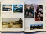 a book with pictures of military planes on the pages