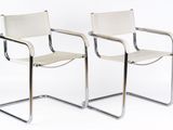 pair of chrome and leather cantile chairs by marcel knoller for knoller