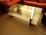 a glass table with a glass top in a living room