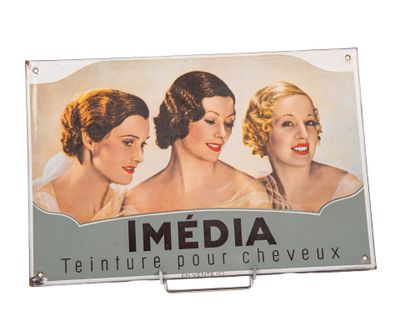 une pancarte sur laquelle est écrit « Media Tenure pour cheveux »