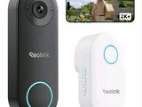 a close up of a camera and a remote control on a white background