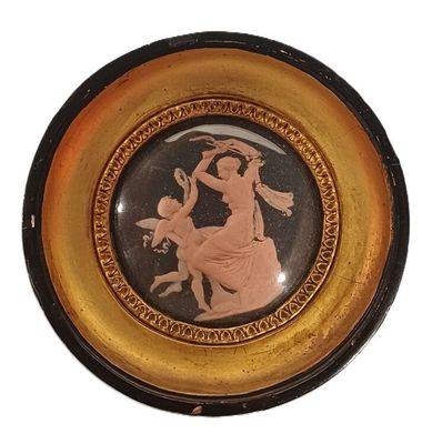 a plate with a picture of a woman and a man on it