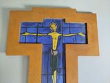 painting of a man on a cross with a blue background