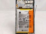 an image of a cell phone with a battery attached to it