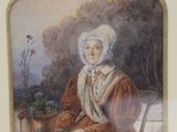 a picture of a woman sitting at a table with a potted plant