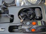 a black case with a radio and a charger in it
