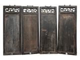 three old wooden doors with decorative designs on them against a white background