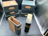 three boxes that are sitting on a table