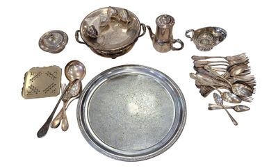 a silver plate with silver spoons and silverware on it