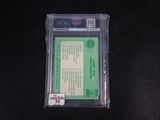 a close up of a baseball card in a plastic case