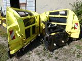 a large yellow machine that is sitting on the ground