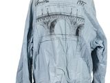 the back of a blue jacket on a mannequin stand
