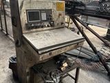 a machine that is sitting inside of a building