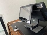 a computer monitor and a laptop on a desk