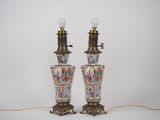pair of antique chinese vase lamps with asian scenes on them